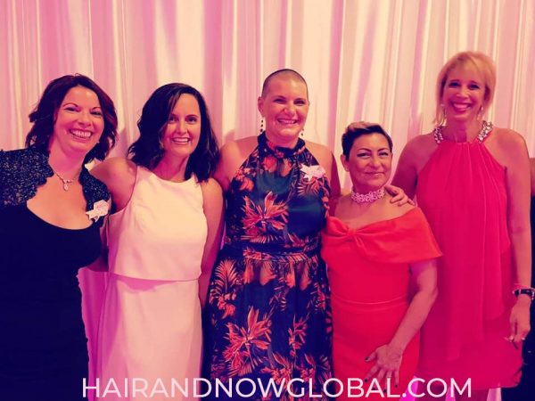 four-women-dressed-in-pink-attending-2018-breast-cancer-gala